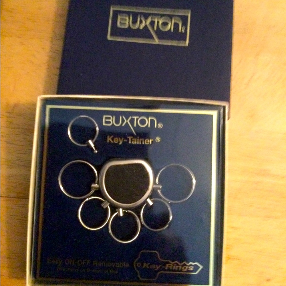 Brand New, Buxton Key-Tainer adjustable key ring. Great teacher gift.